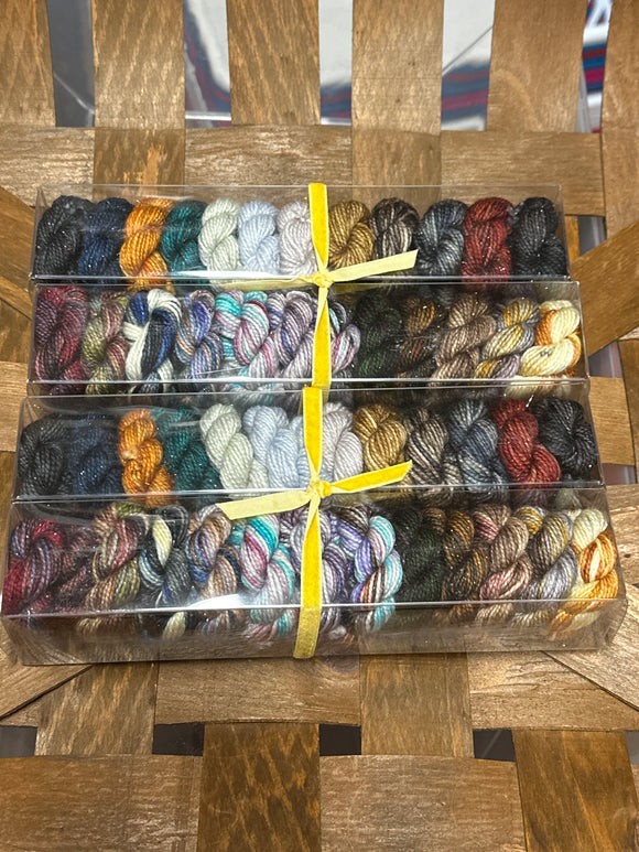 Crescent City; Minis set on Oscar Sparkle Fingering Weight Yarn